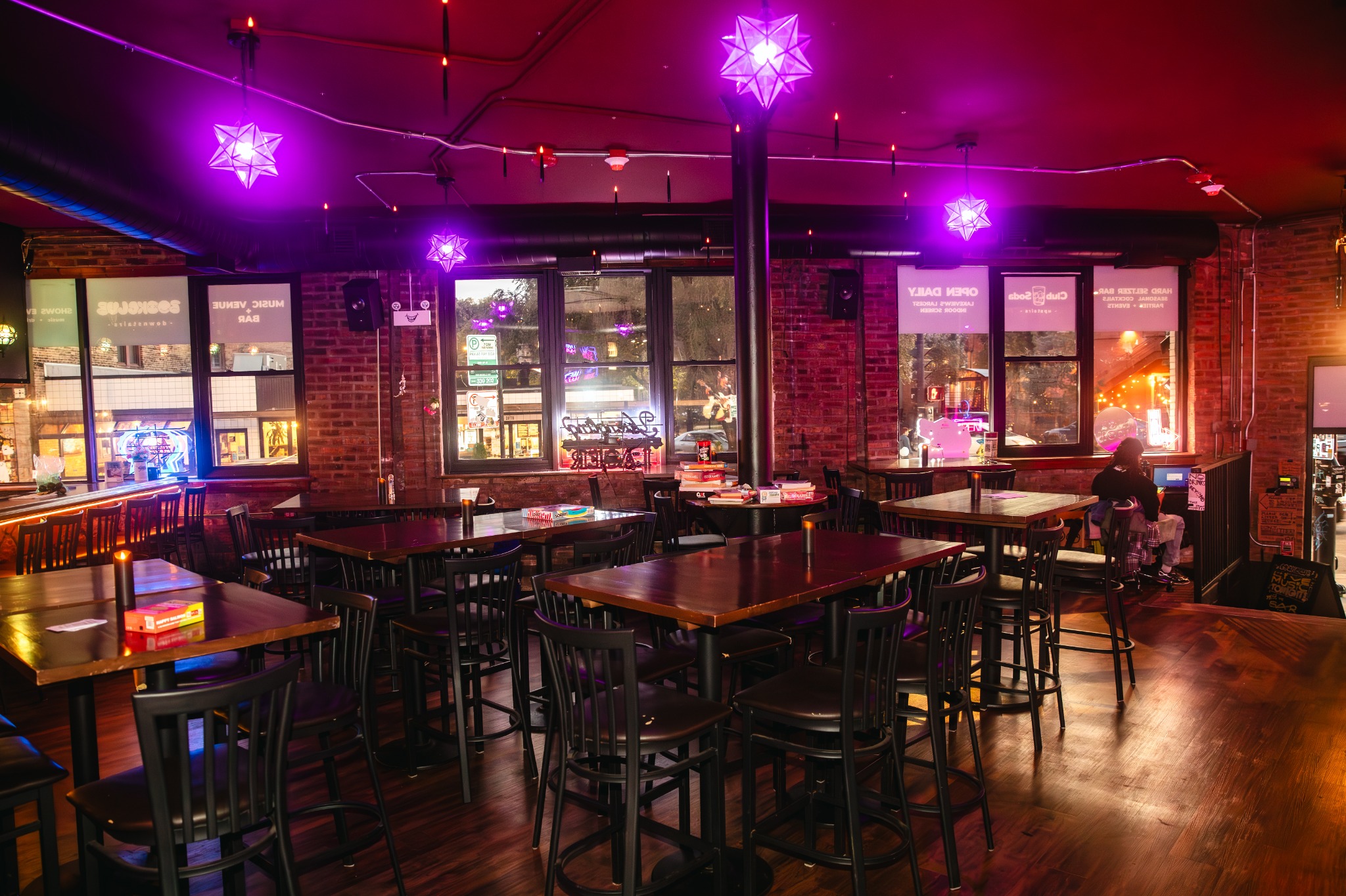 Tables and seating arranged inside BOOKCLUB's Lakeview venue